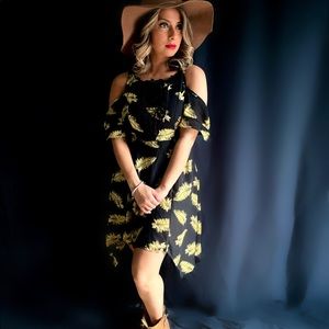 Black triangle cut dress. Flowy .